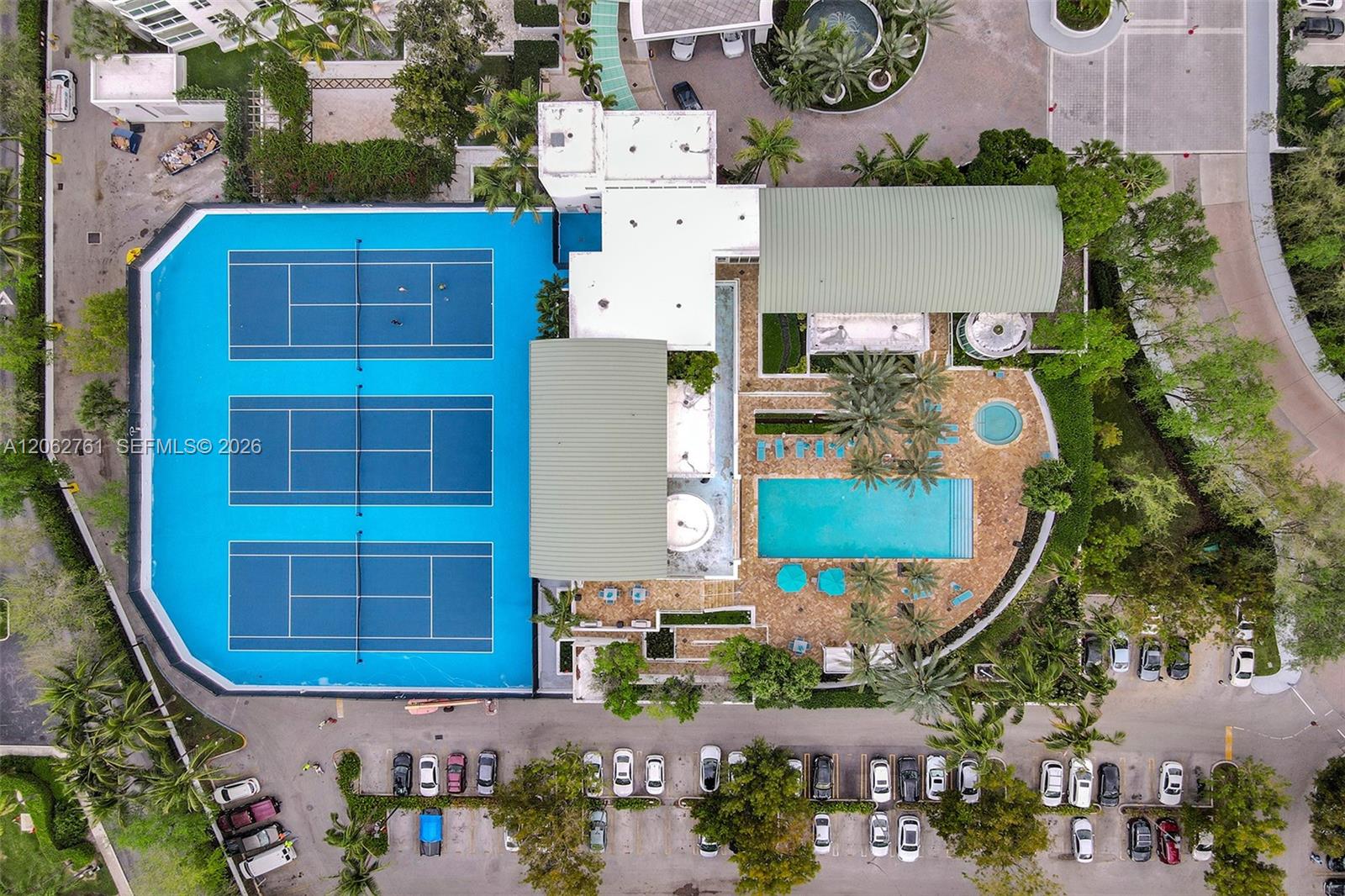 Photo of 3201 183rd St  #2403, Aventura, Florida, 33160 - View of the second pool and tennis courts.