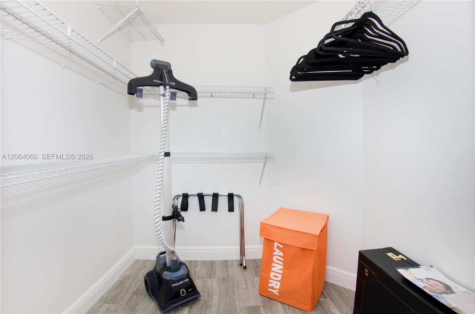 Photo of 17150 Bay Rd  #2408, Sunny Isles Beach, Florida, 33160 - walking closet guest suite