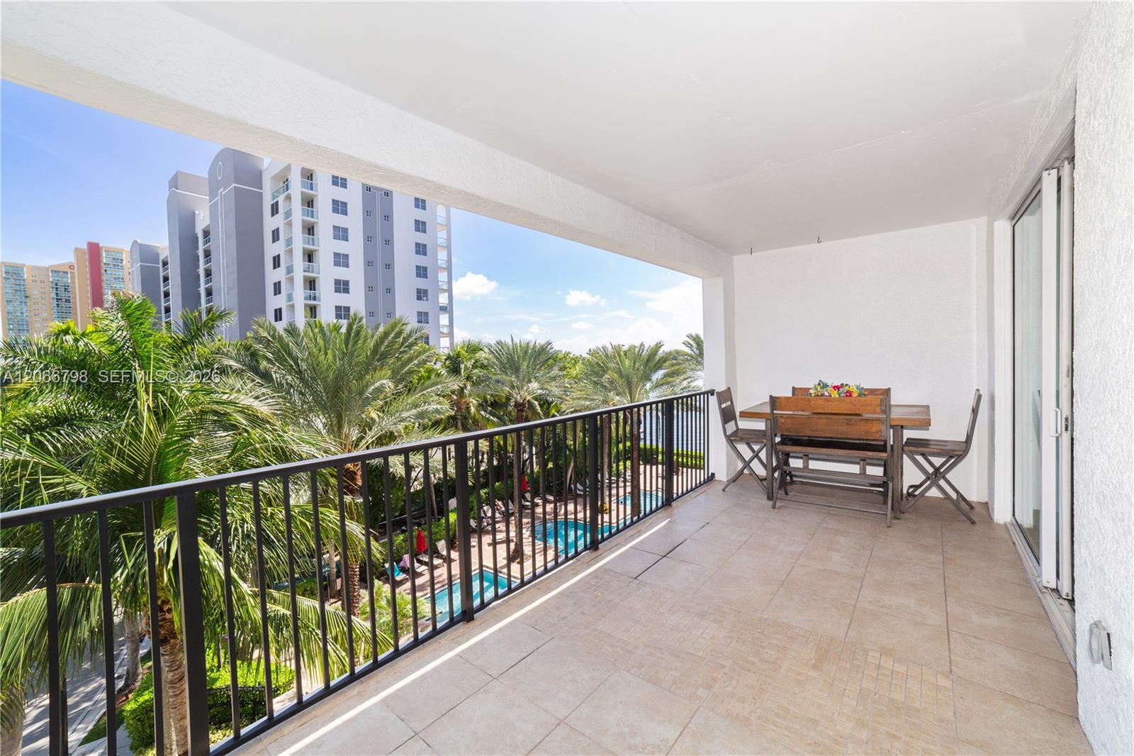 Photo of 17100 Bay Rd #1501, Sunny Isles Beach, Florida, 33160 - Double balcony from living and dining