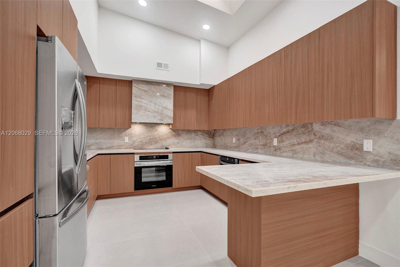 All new! Quartz countertops, new appliances, cabinetry, double sinks. Skylight.