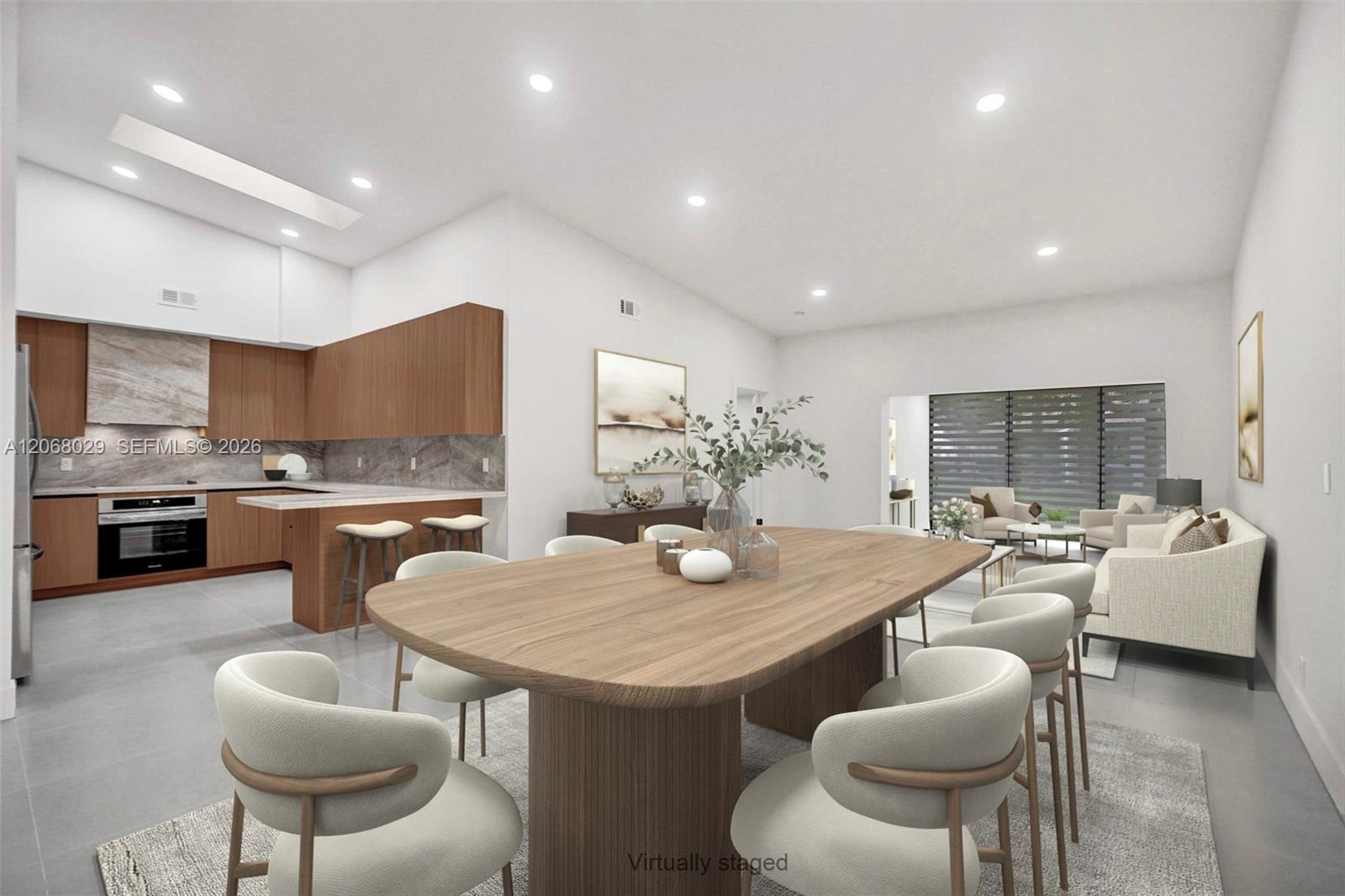 Virtually staged to show living room dining room.