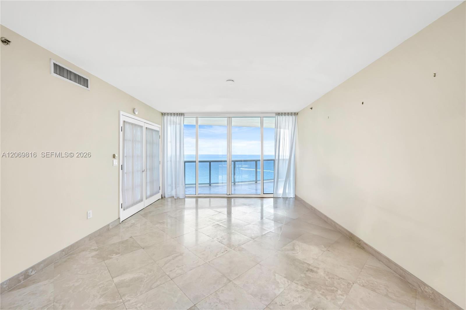 Photo of 18911 Collins Ave  #2906, Sunny Isles Beach, Florida, 33160 - Living room with ocean views