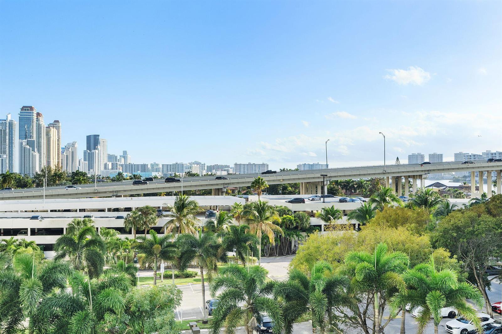 Photo of 19380 Collins  #523, Sunny Isles Beach, Florida, 33160 - Balcony with canal glimpse