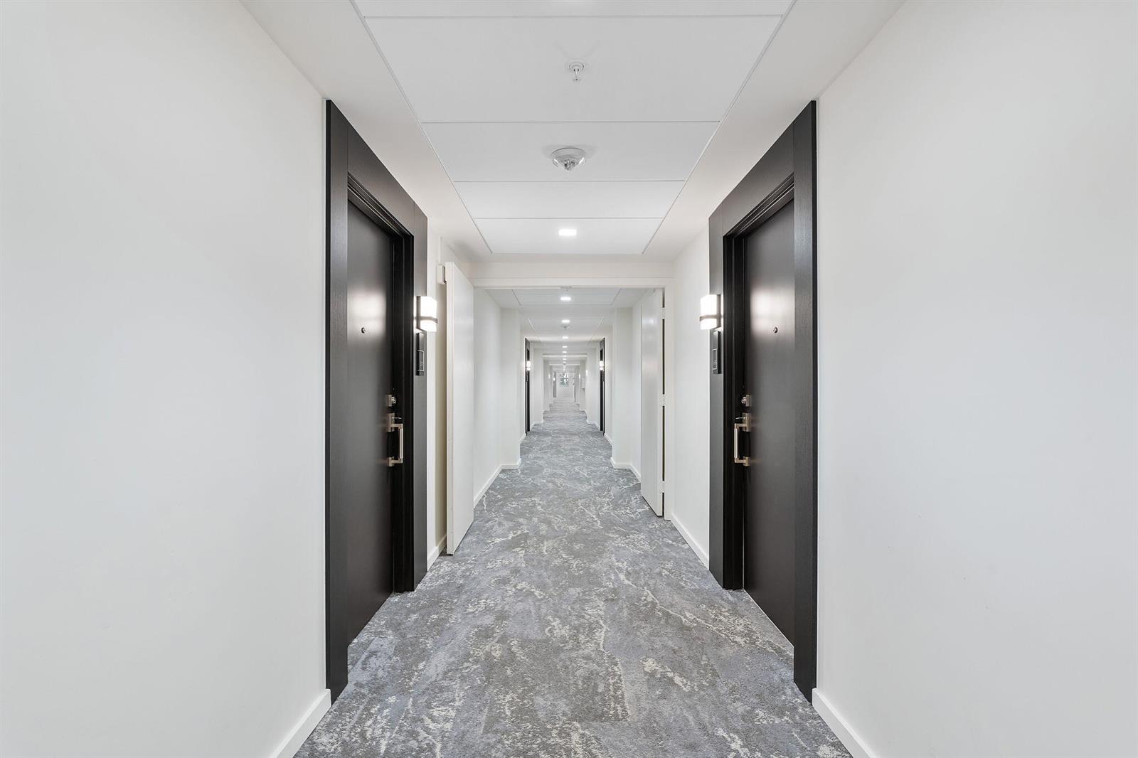 Photo of 19380 Collins  #523, Sunny Isles Beach, Florida, 33160 - Hallway leading to the unit