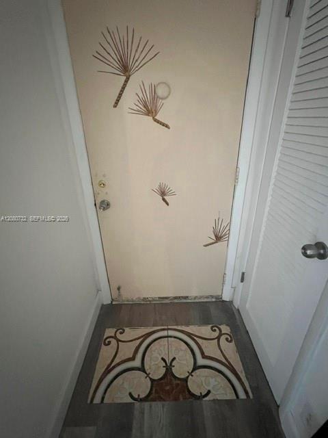 tiled entrance and door