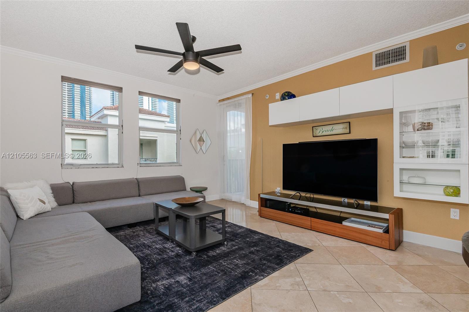 Recessed lighting, ceiling fan, and tile flooring