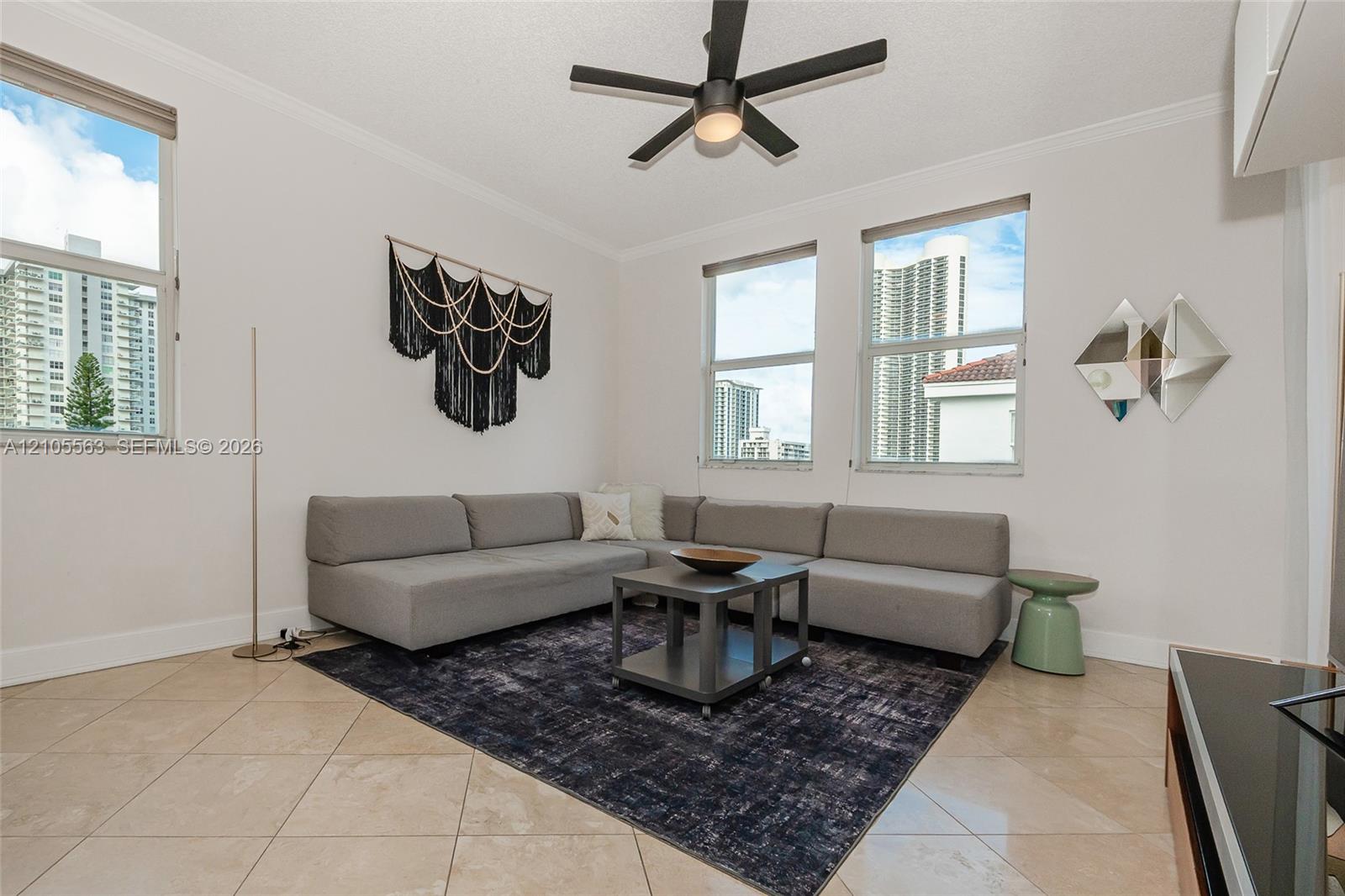 Recessed lighting, tile flooring, and a ceiling fan with integrated lighting