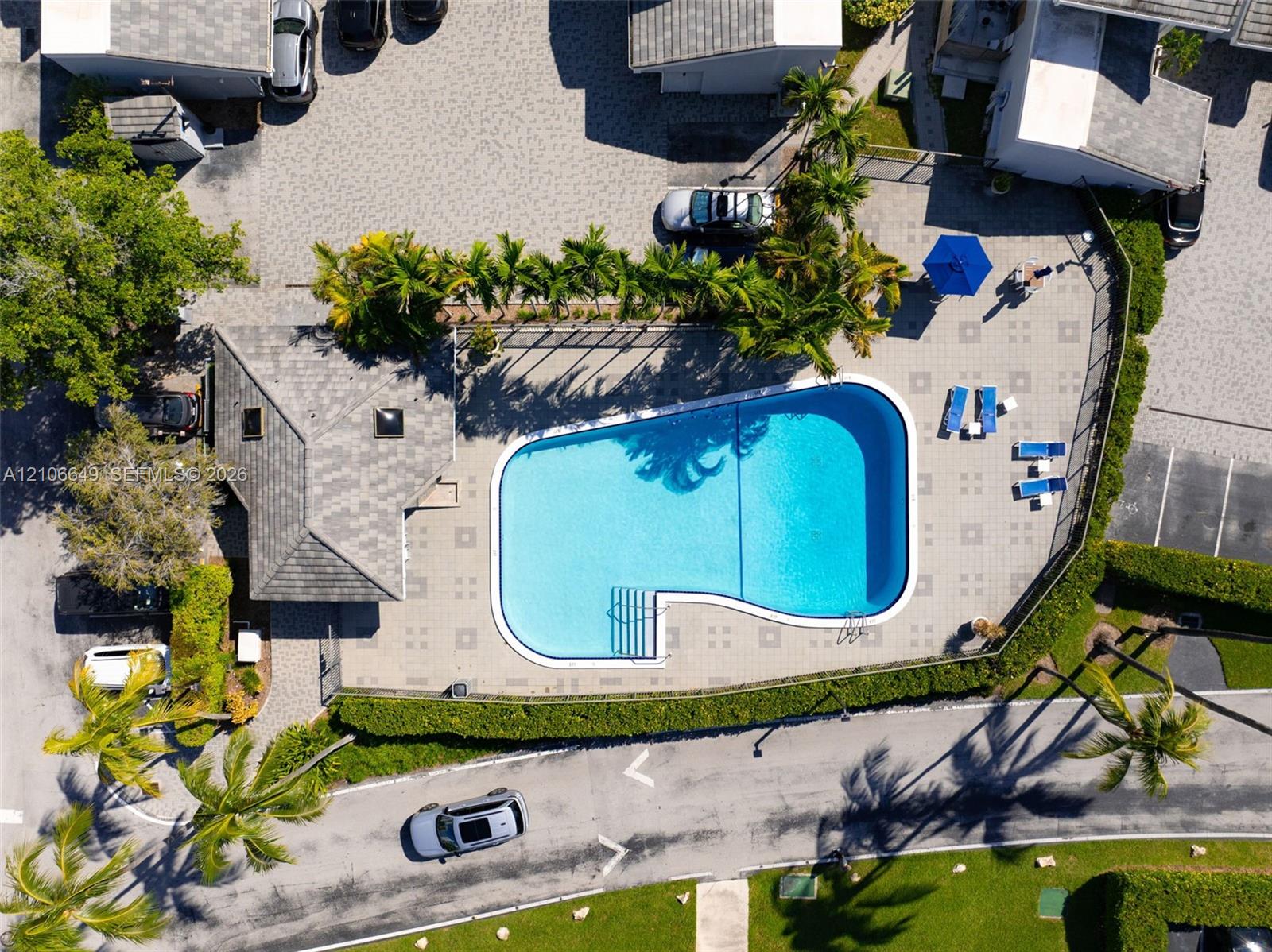 Waterfront residential community featuring three hard-surface tennis courts and immediate canal access