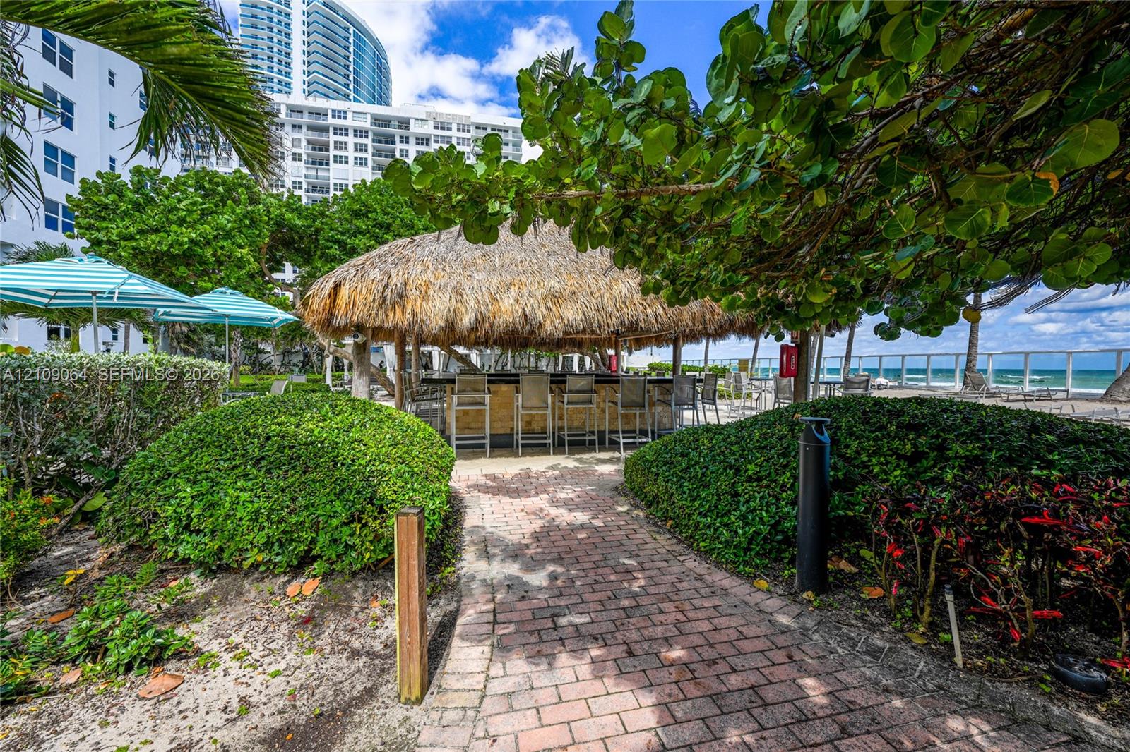 Direct oceanfront access with expansive sandy shoreline